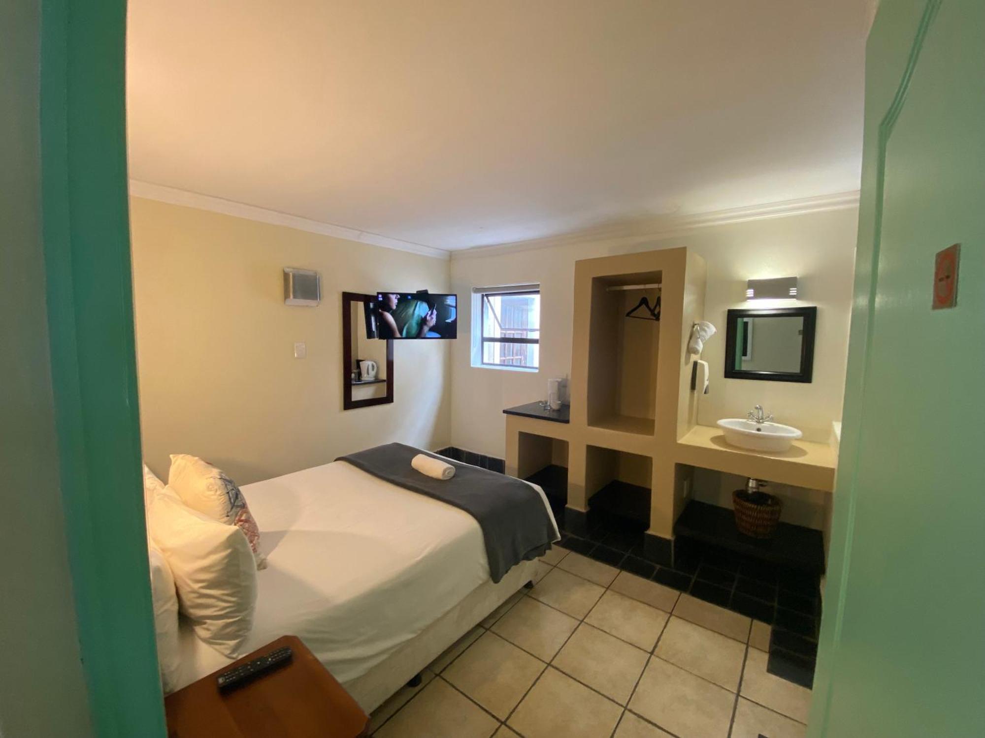 Green Door Guesthouse Mosselbaai Kamer foto
