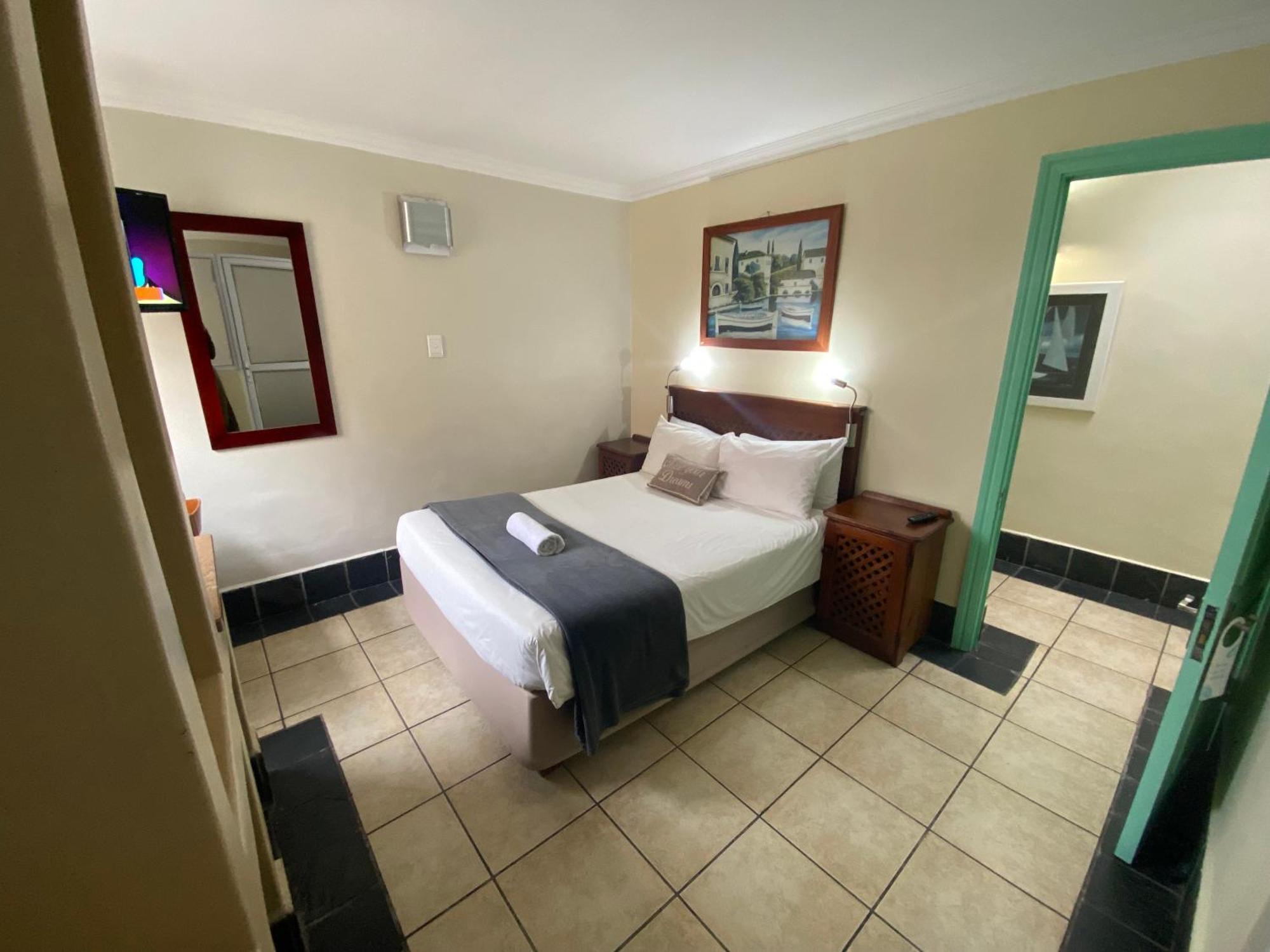 Green Door Guesthouse Mosselbaai Kamer foto