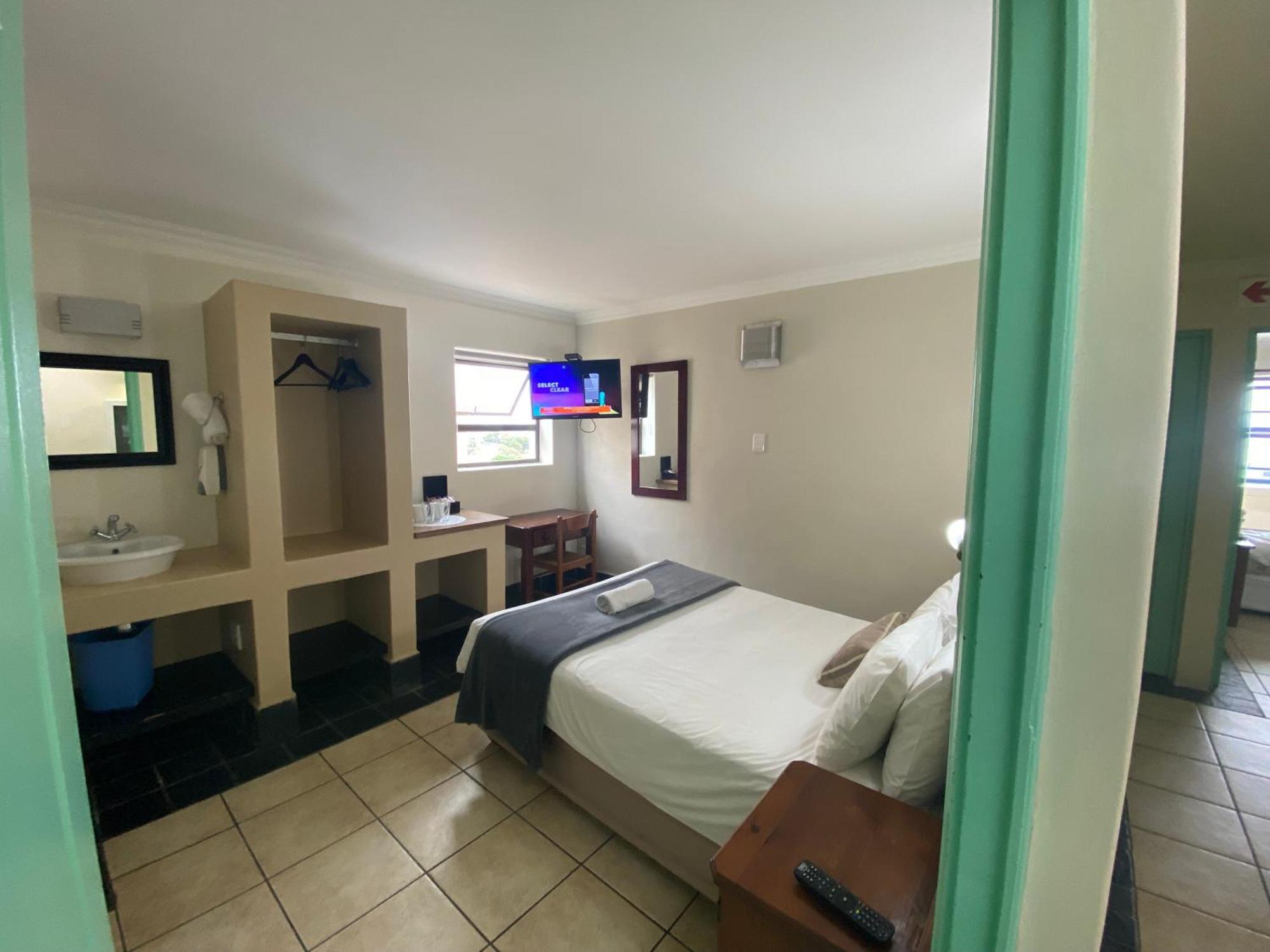 Green Door Guesthouse Mosselbaai Kamer foto